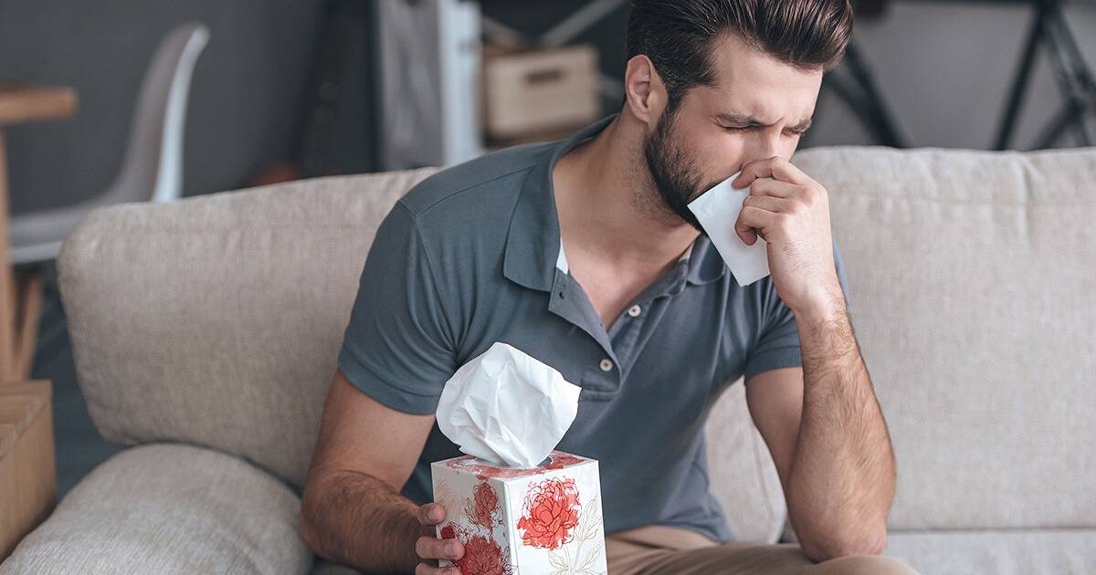 a z air duct man suffering from indoor allergies